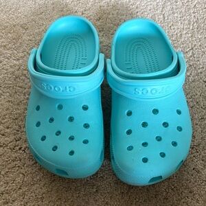 Teal Crocs